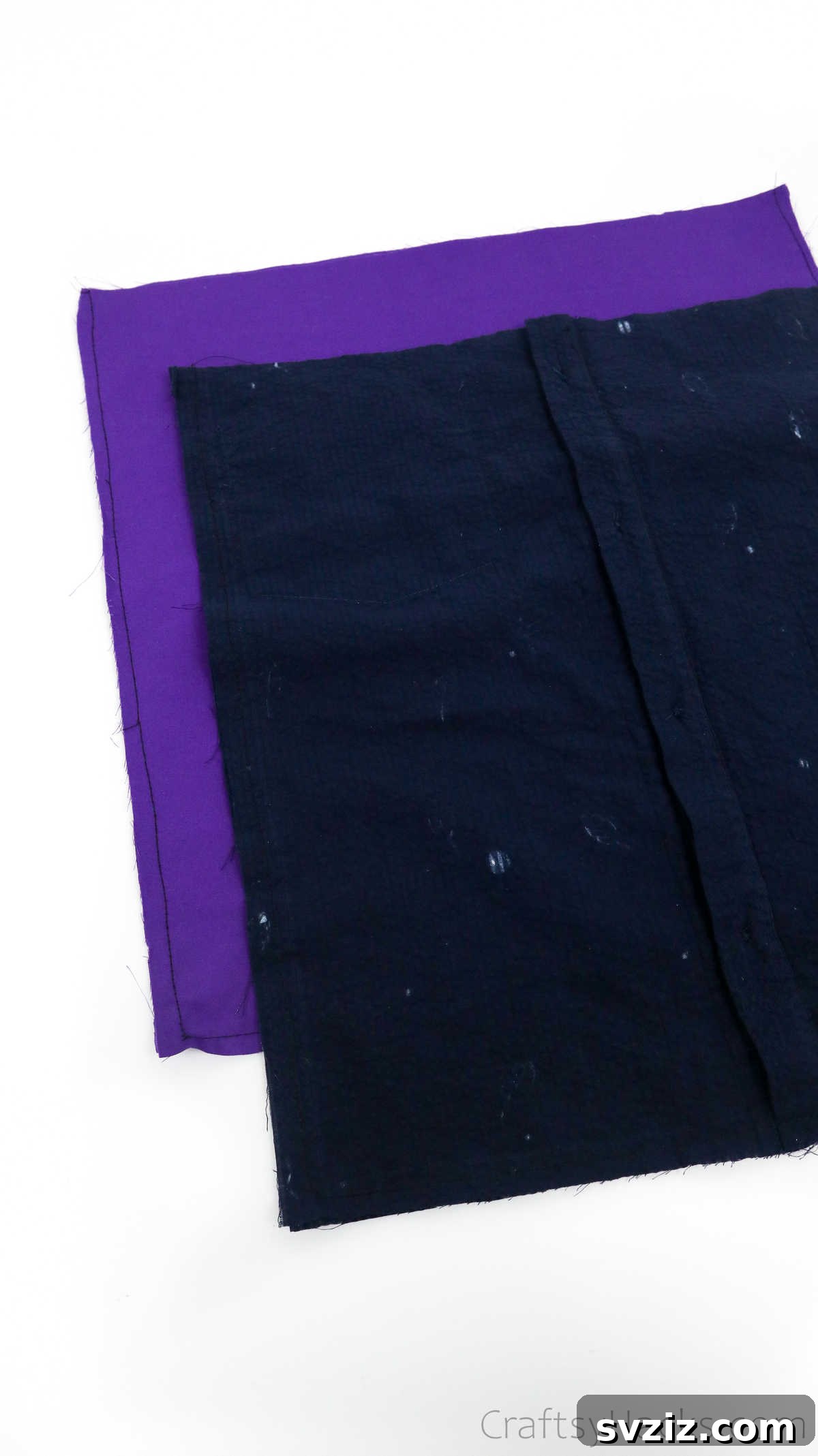 Two sewn fabric pouches (outer and lining) from the DIY tote bag project, showcasing progress
