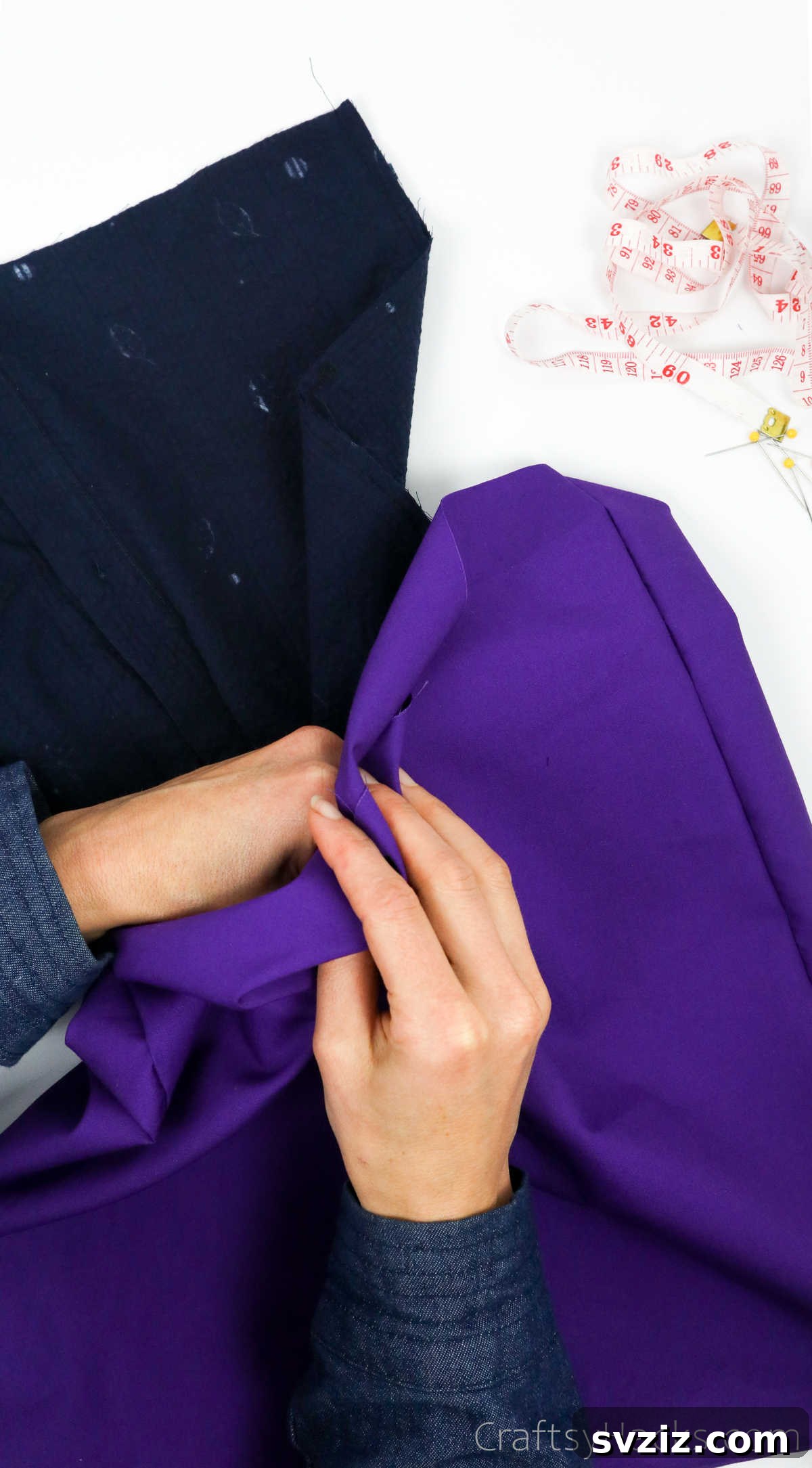 Inserting the outer shirt fabric into the lining fabric, combining the two layers of the tote bag