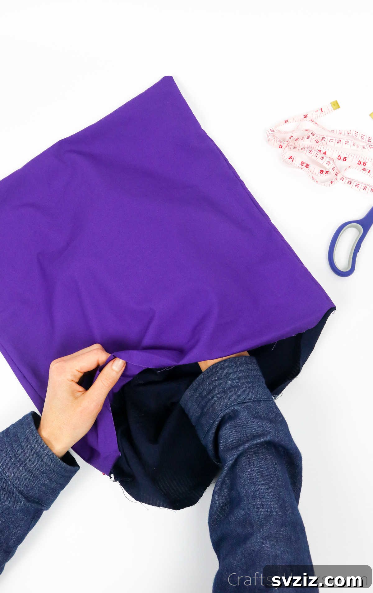 Outer shirt fabric neatly placed inside the lining, forming the main body of the tote bag