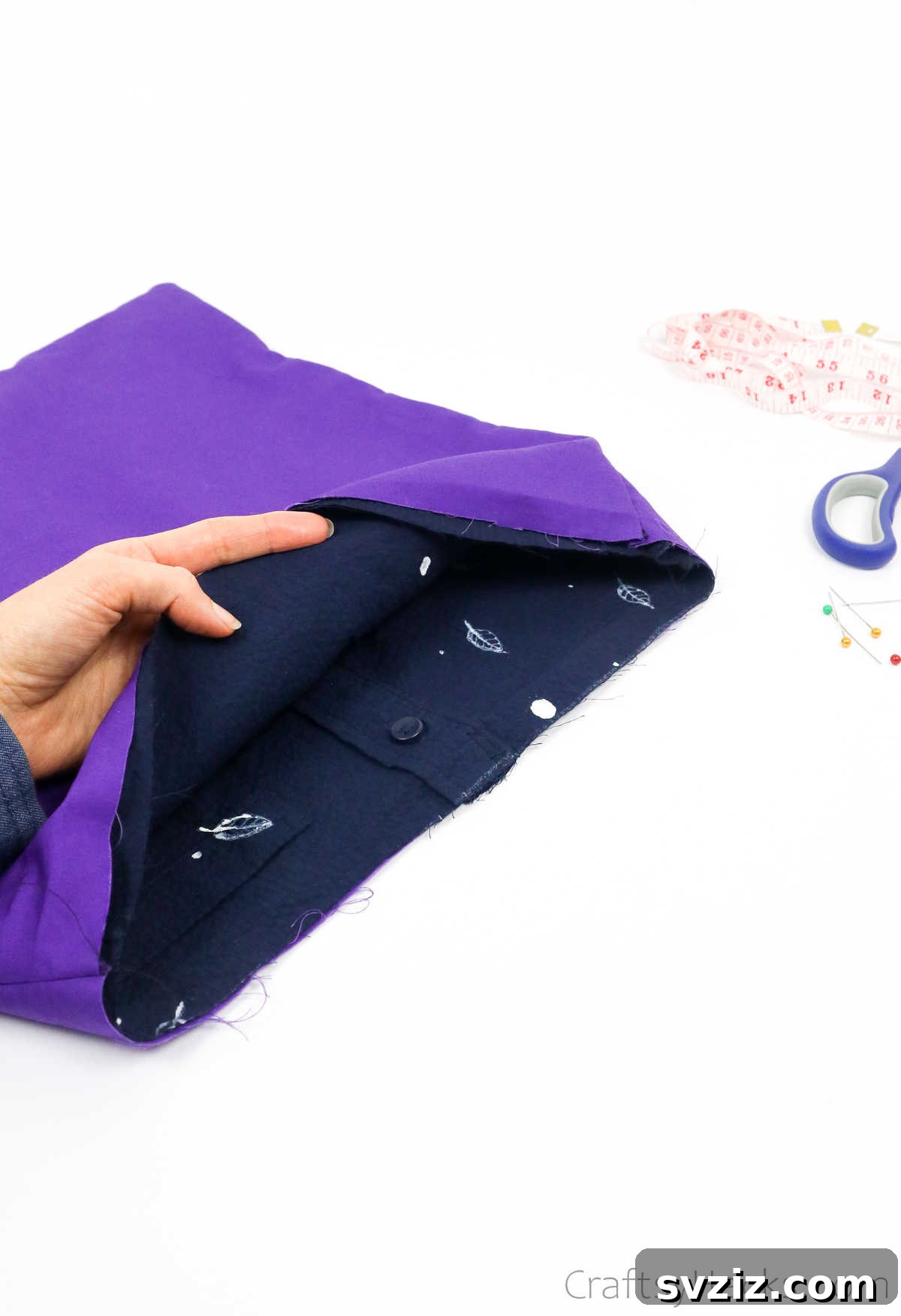 Close-up of shirt fabric combined with lining, showing the smooth interior of the developing tote