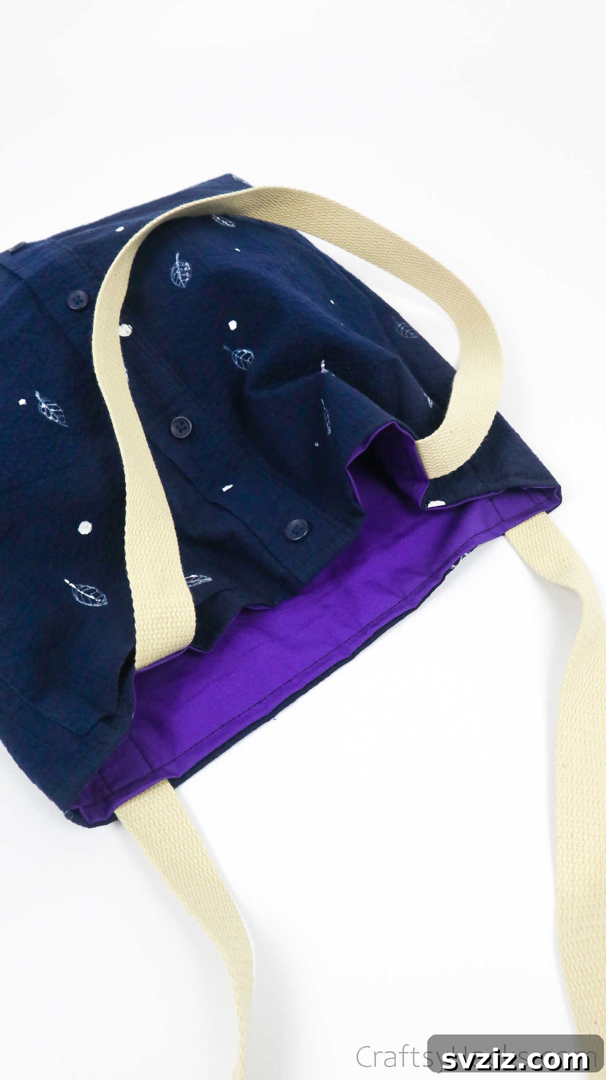 A beautifully completed DIY tote bag from an old shirt, ready for use