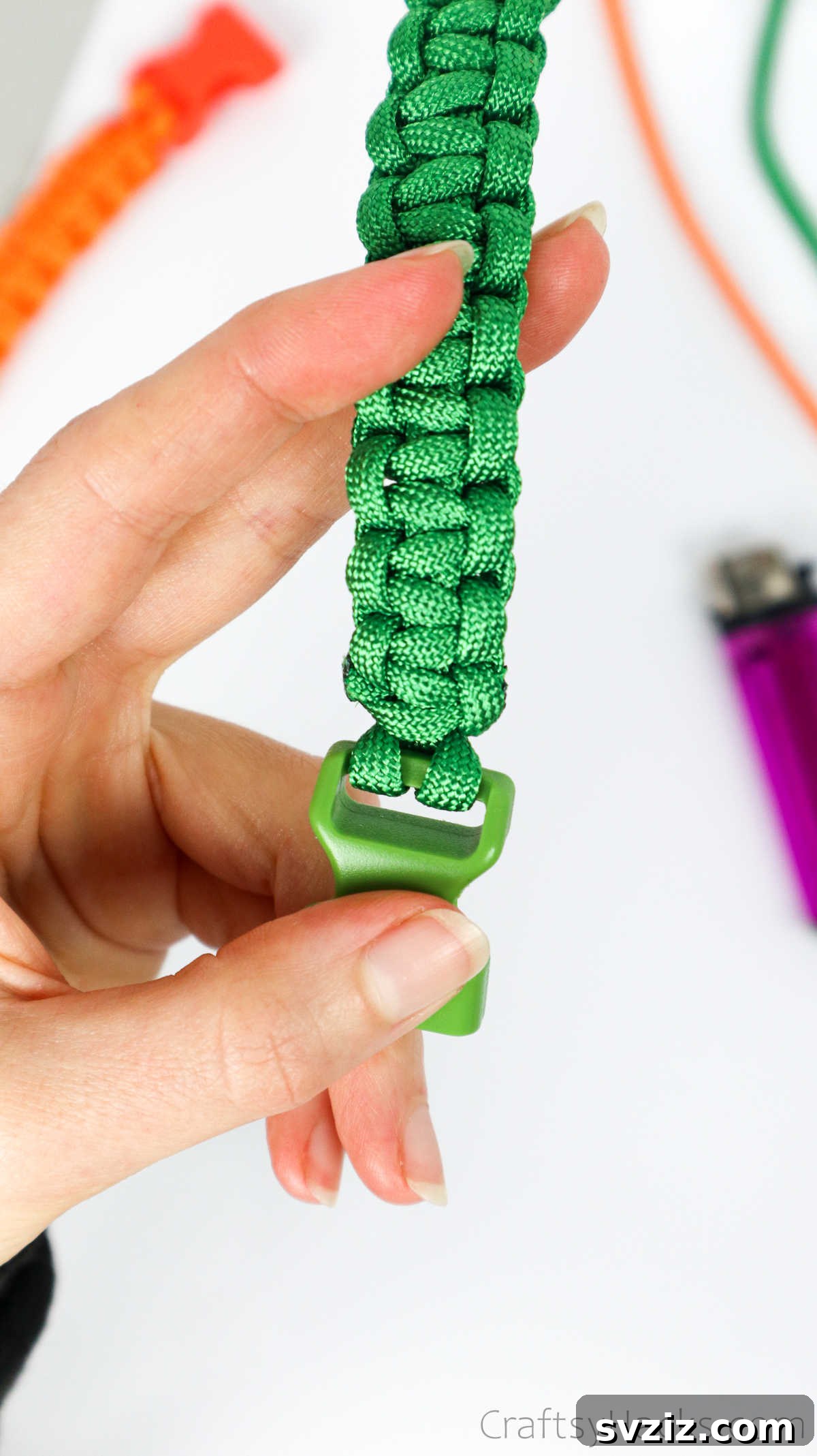 A close-up view of the underside of the paracord bracelet, showing the neatly finished and fused ends.