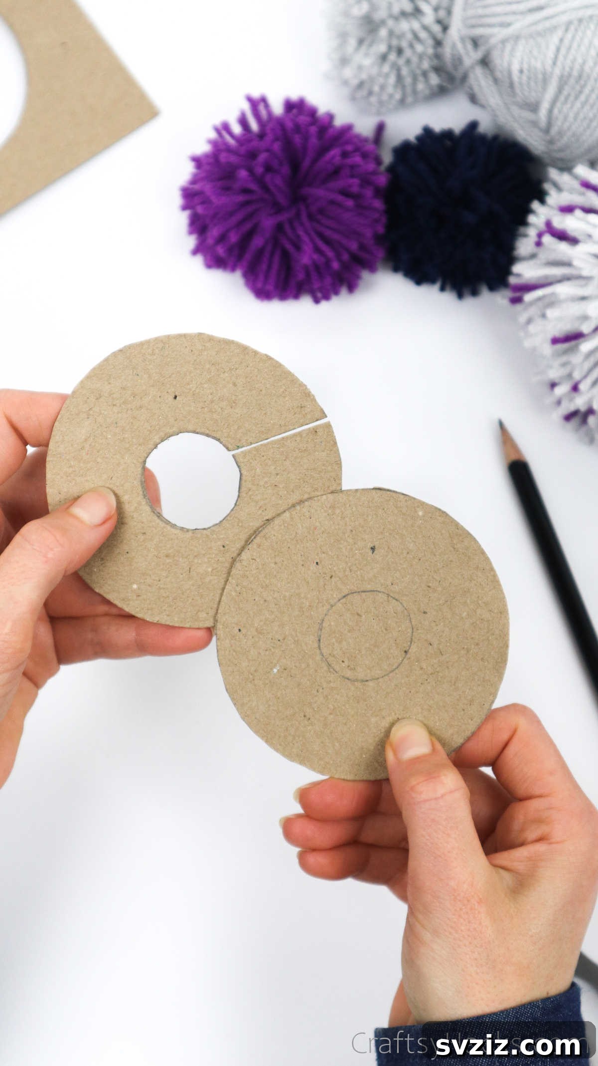 Two cardboard donut templates aligned on top of each other