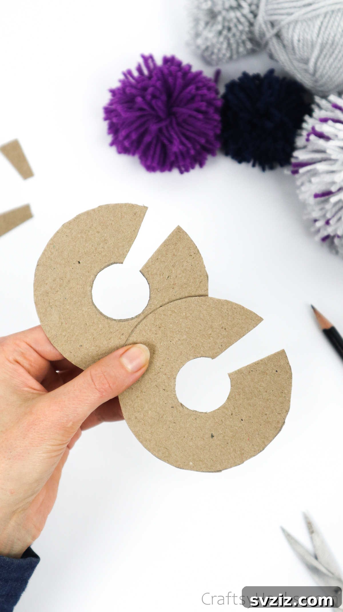 Another view of the cardboard pom pom templates, ready for yarn