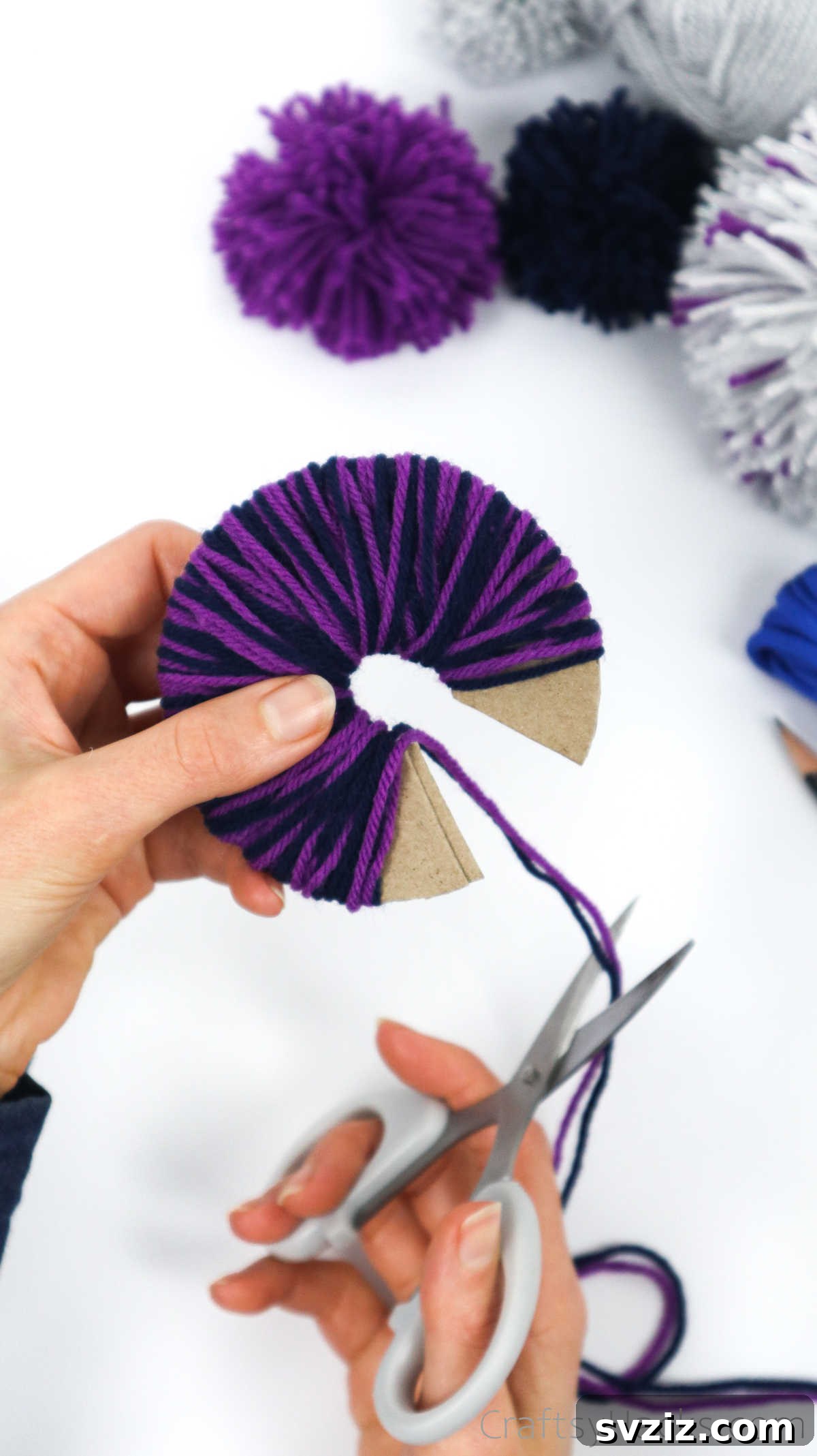 Snipping off the end of the yarn after wrapping