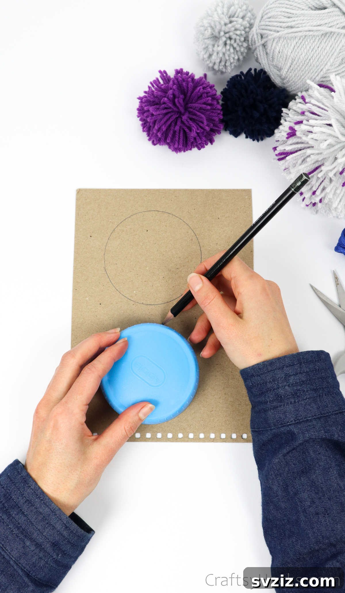 Tracing a circle onto a piece of cardboard with a shaker lid