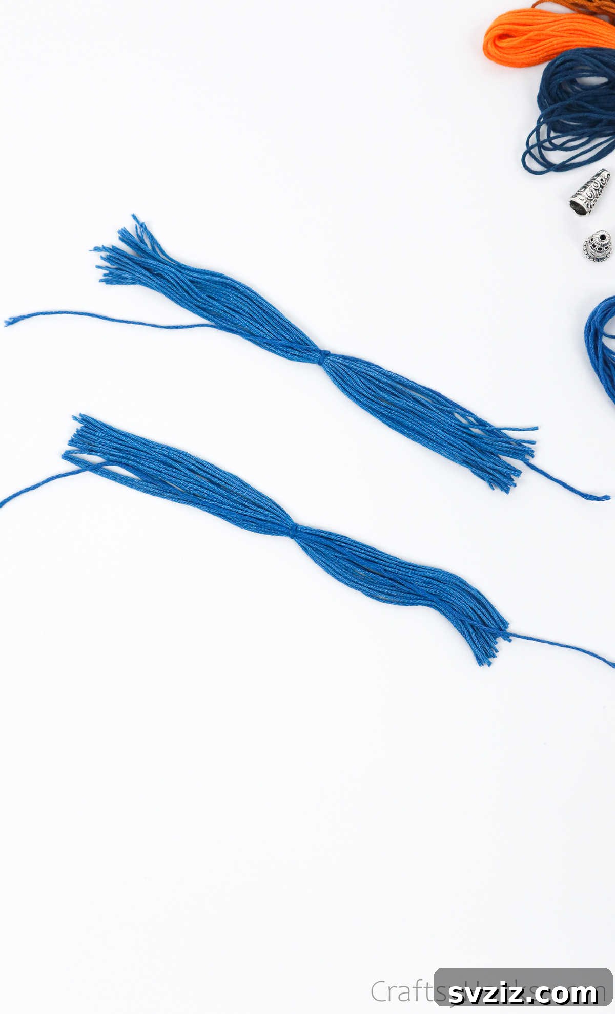 Craft Your Own Trendy Tassel Earrings 14 tied knot around thread