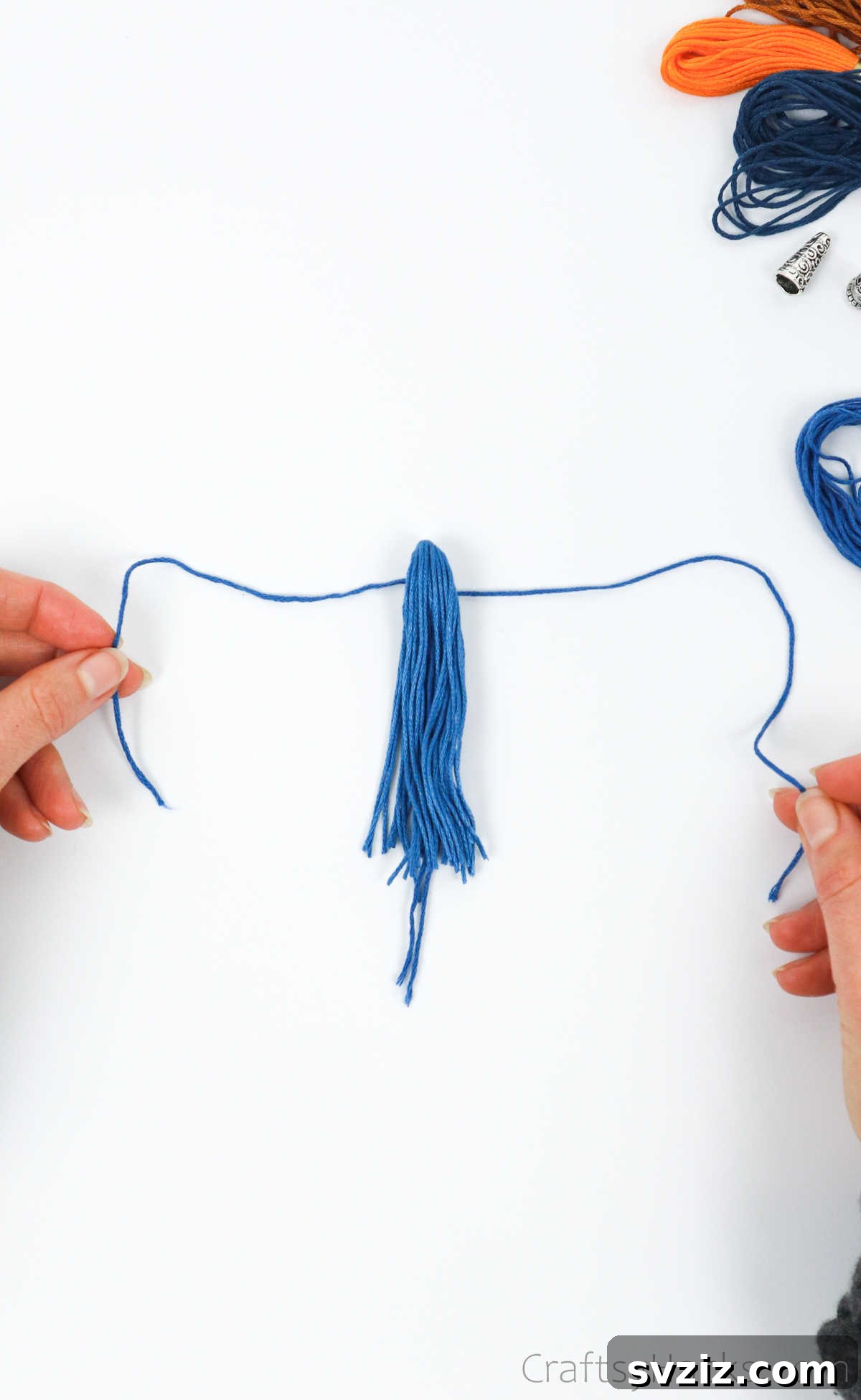 Craft Your Own Trendy Tassel Earrings 16 wrapping thread