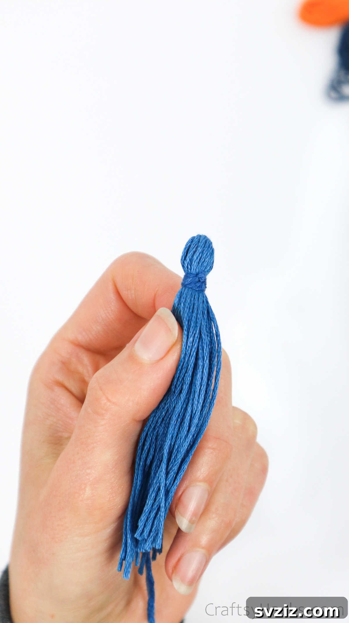 Craft Your Own Trendy Tassel Earrings 21 thread wrapped around