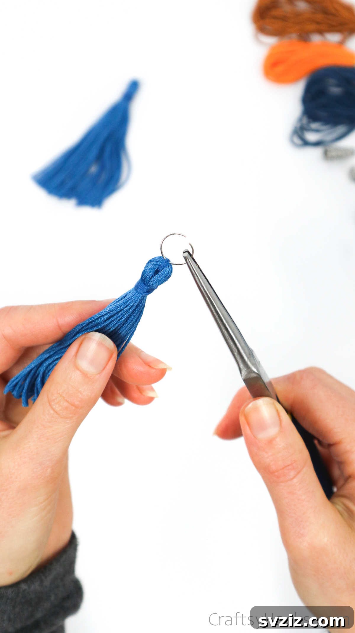 Craft Your Own Trendy Tassel Earrings 24 adding hoop