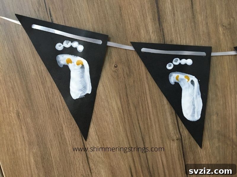 Creative Handprint Projects for Kids 19 Halloween Footprint Banner