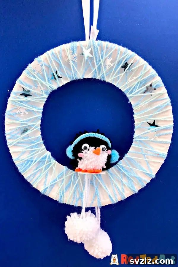 51 Creative Pom-Pom Projects 31 Penguin Wreath