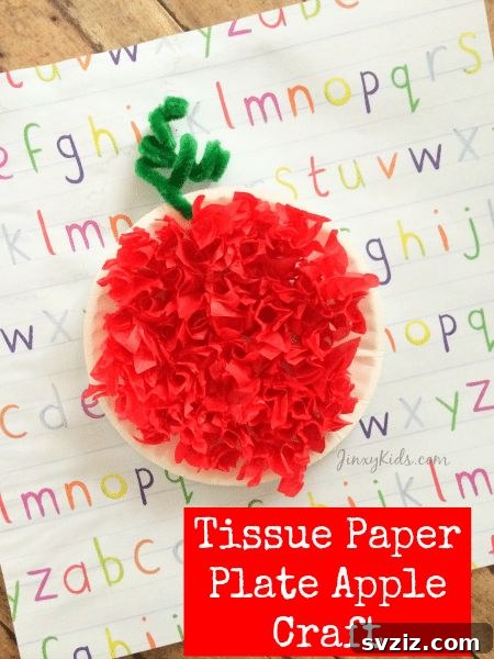 Crafting Smiles: Paper Plate Fun for Kids 13 Vibrant tissue paper apple craft made from a paper plate, offering a rich textured look.