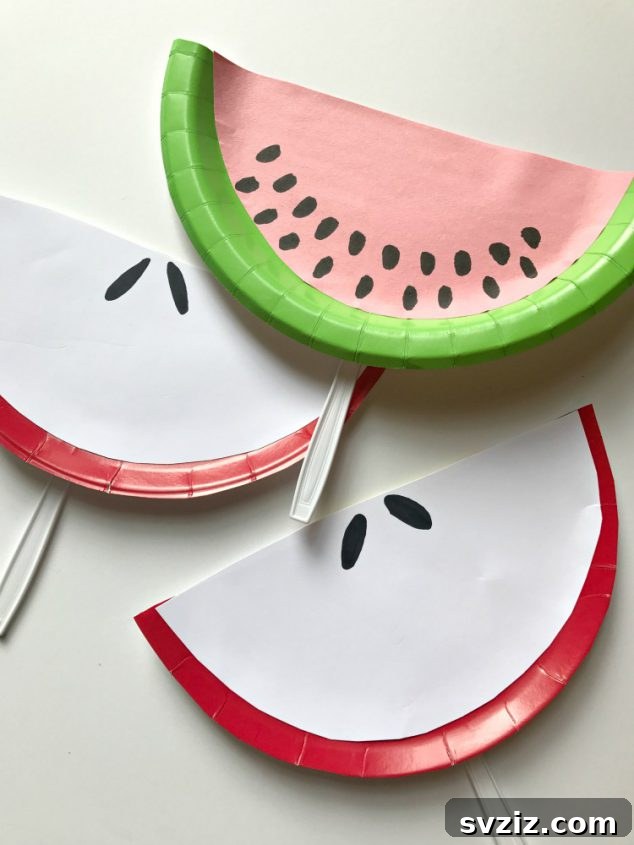 Crafting Smiles: Paper Plate Fun for Kids 20 Vibrant paper plate fruit slice fans, featuring watermelon and citrus designs, perfect for summer.