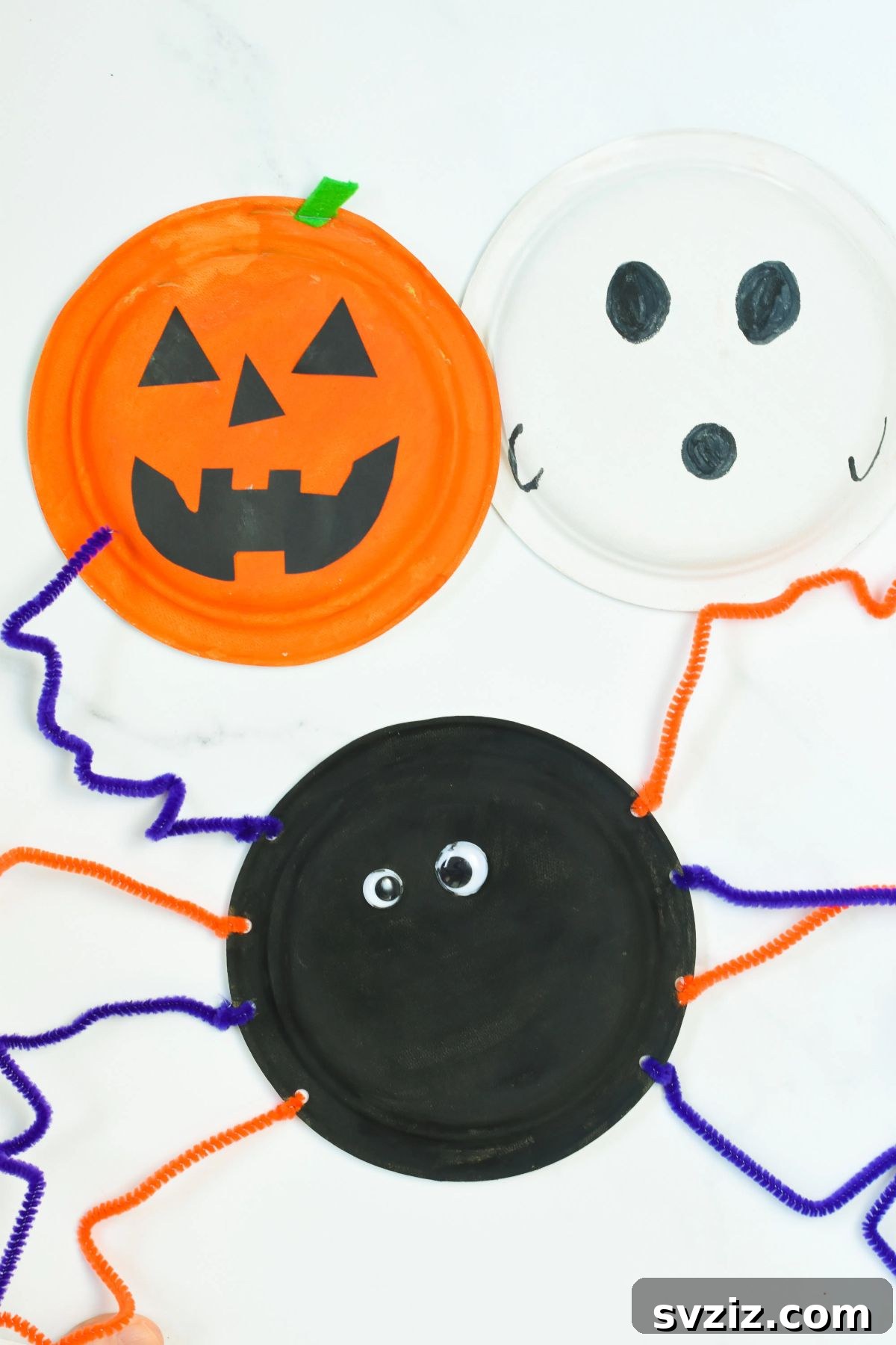 Crafting Smiles: Paper Plate Fun for Kids 42 Collection of classic paper plate Halloween crafts including a ghost, pumpkin, and a Frankenstein monster.