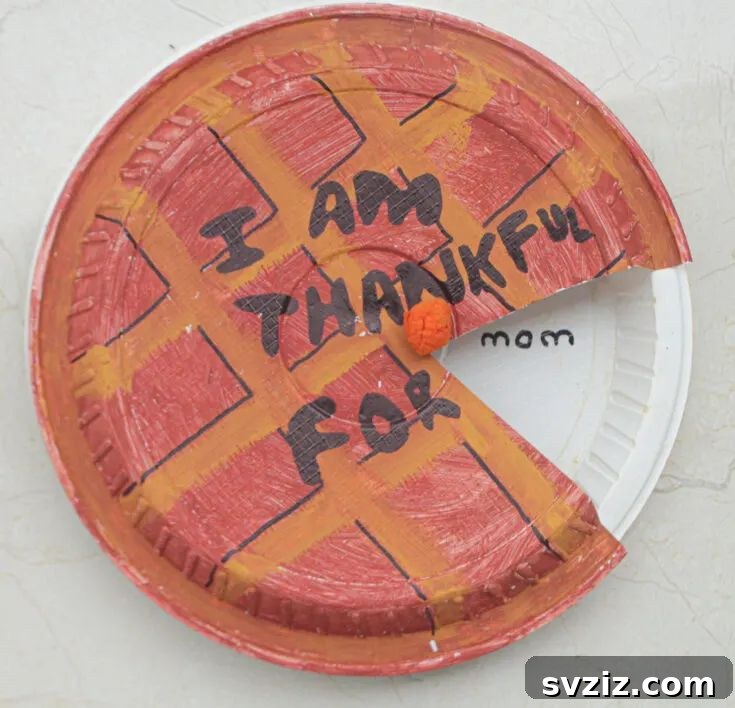 Crafting Smiles: Paper Plate Fun for Kids 49 Interactive paper plate Thanksgiving thankful wheel, divided into sections for listing things to be grateful for.