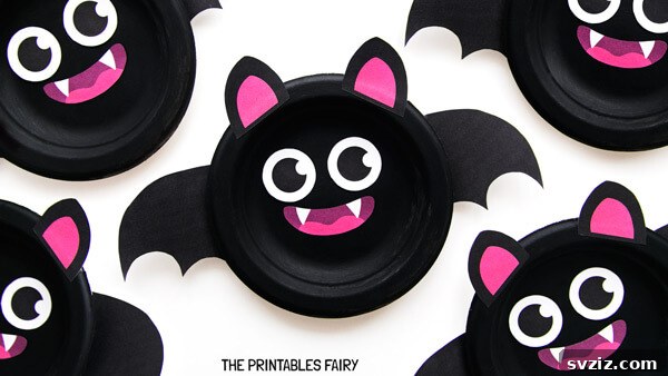 Crafting Smiles: Paper Plate Fun for Kids 7 Cute paper plate bat craft with large googly eyes and pointed ears, ideal for non-spooky Halloween decor.