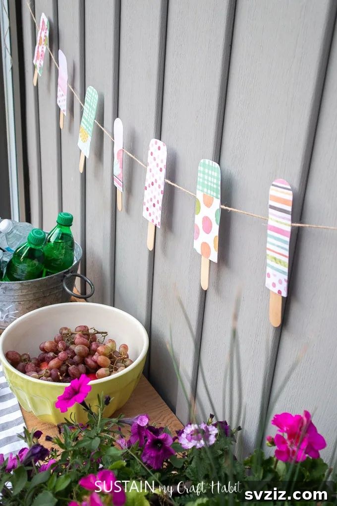 Effortless Elegance: 51 DIY Party Decor Ideas 16 Colorful Summer Garland with Paper Popsicles