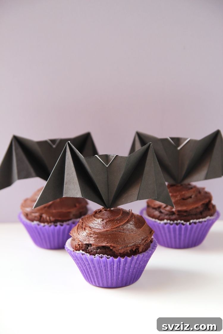 Effortless Elegance: 51 DIY Party Decor Ideas 22 Origami Bat Cupcake Toppers for Halloween