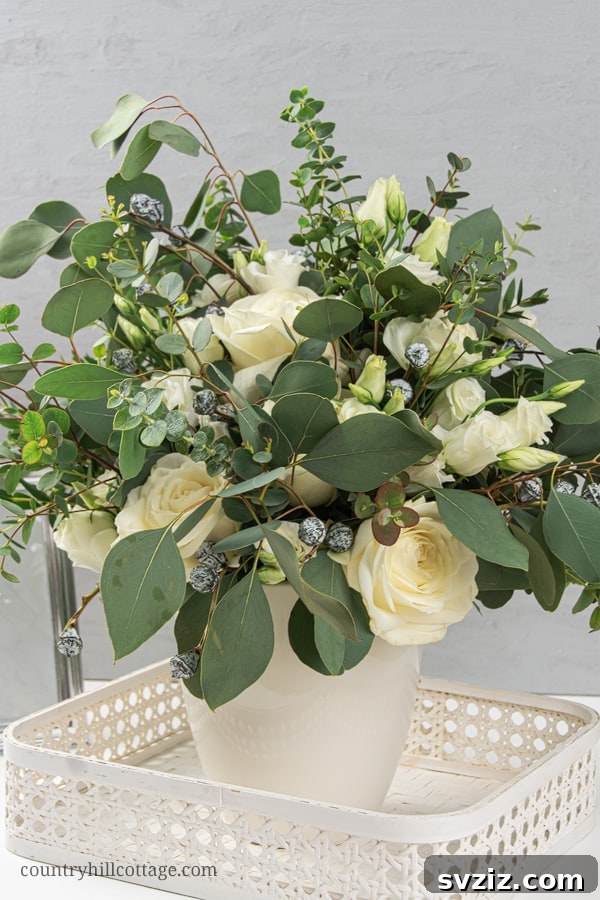 Effortless Elegance: 51 DIY Party Decor Ideas 35 Fresh DIY Eucalyptus and Rose Arrangement