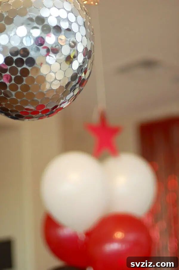 Effortless Elegance: 51 DIY Party Decor Ideas 39 Sparkling Disco Ball Pinata for Parties
