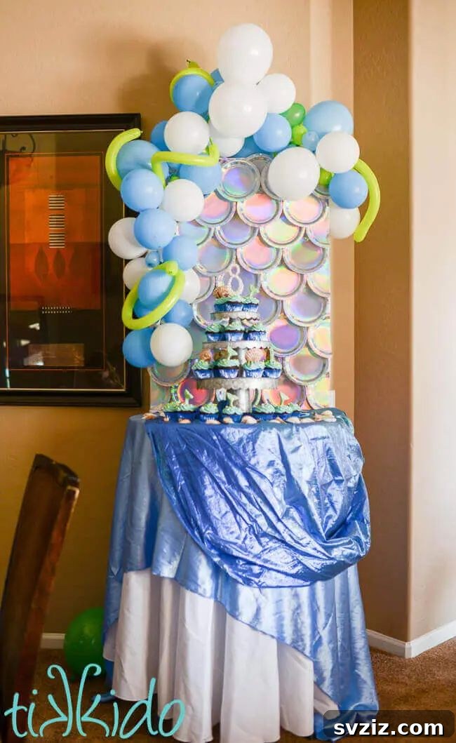 Effortless Elegance: 51 DIY Party Decor Ideas 10 DIY Mermaid Scales Party Backdrop