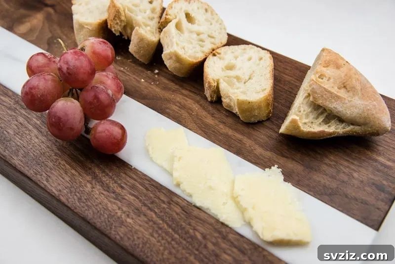 51 Heartfelt DIY Gifts for Their New Beginning 23 Handmade Walnut Cutting Board with Marble Inlay