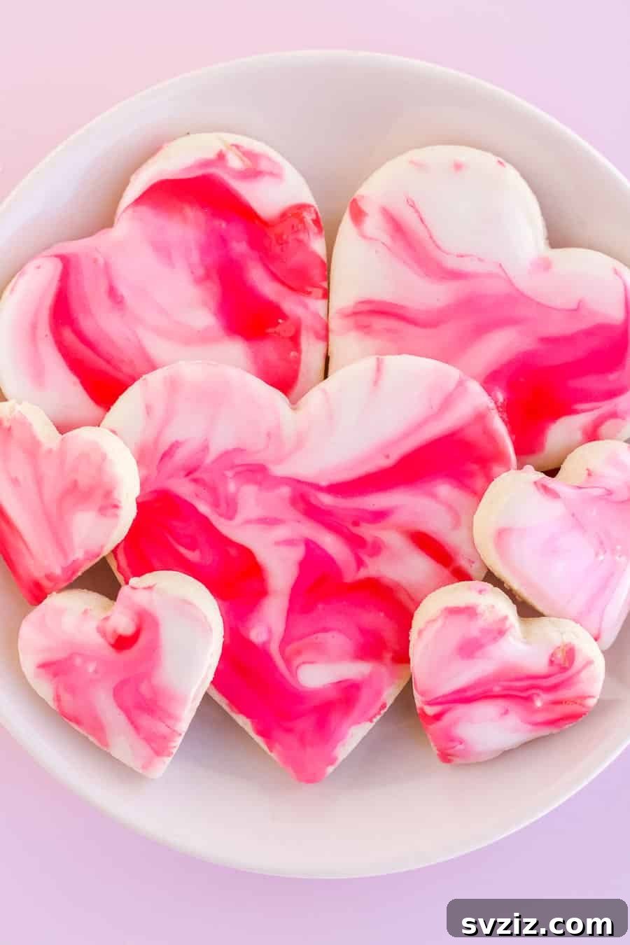 51 Heartfelt DIY Gifts for Their New Beginning 34 Gourmet Marbled Cookies with intricate icing designs