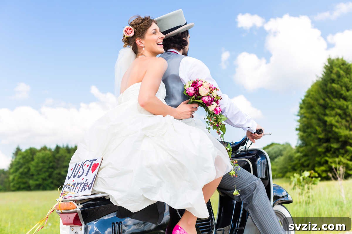 A newlywed couple riding away on a classic retro motorcycle for their send-off