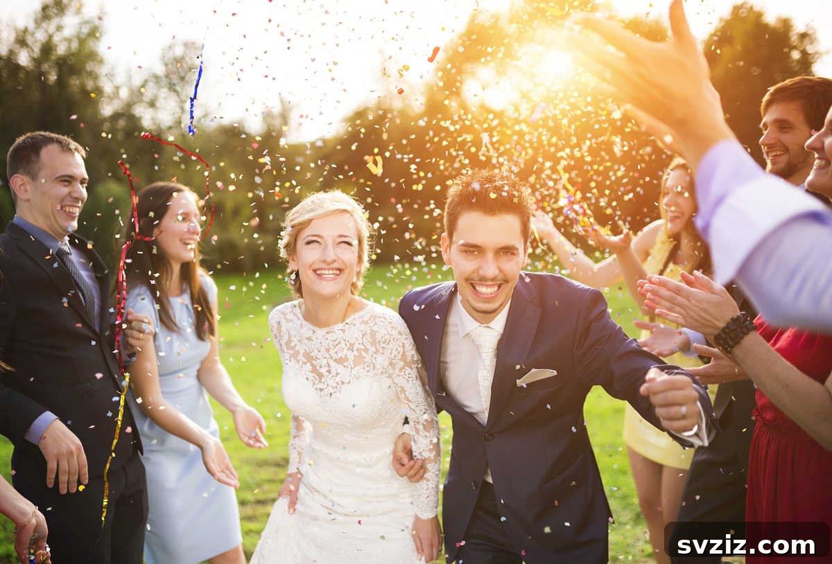 Wedding guests tossing environmentally friendly biodegradable confetti during an exit
