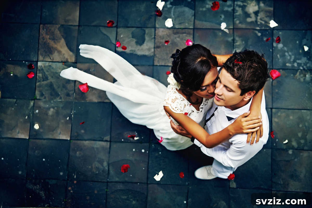 A romantic send-off with guests showering the couple with rose petals