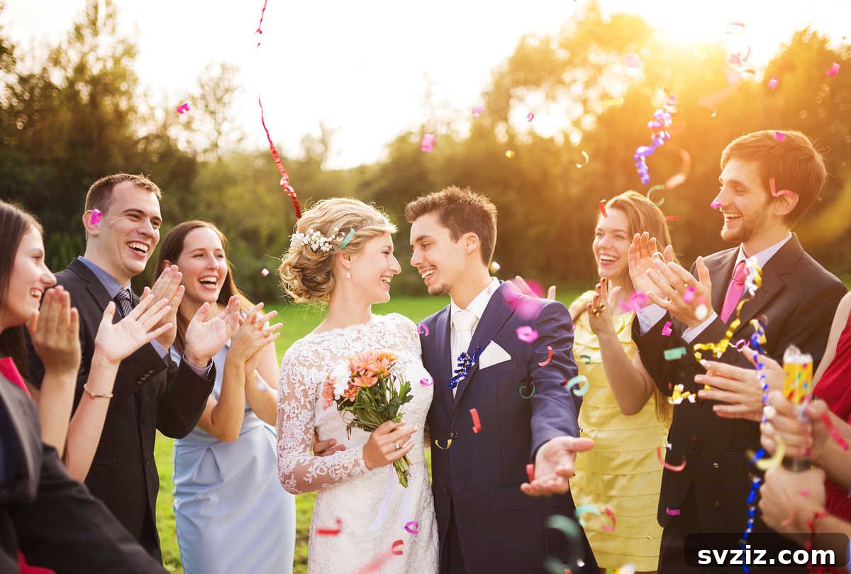 Joyful wedding guests tossing colorful confetti during the couple's exit