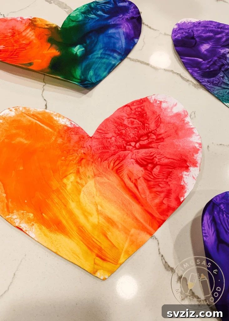 Colorful mess-free smush paintings in a ziplock bag, perfect for toddlers to create art without the mess.