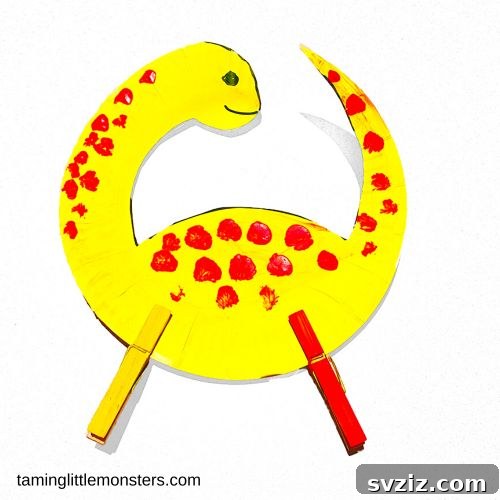 A creative paper plate dinosaur craft with clothespin legs, great for teaching colors, numbers, and animals to kids.