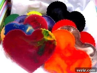 Heart-shaped DIY crayons made from melted crayon bits, a colorful and eco-friendly craft for kids.