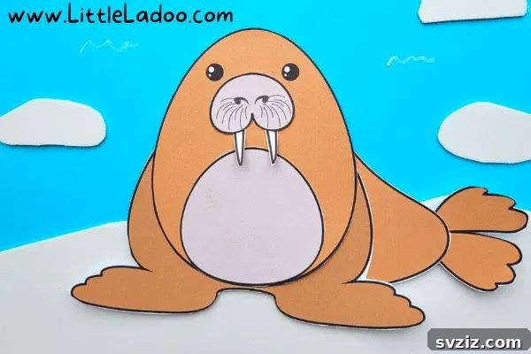 An adorable walrus craft made from cut paper pieces, a fun activity with a free template for kids.