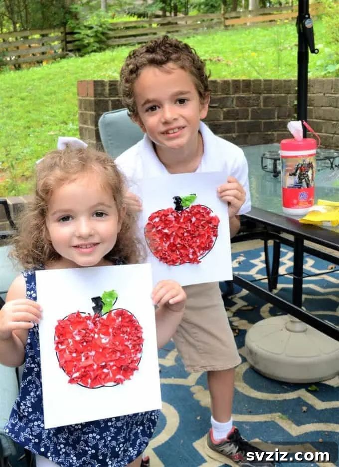 A vibrant tissue paper apple craft, perfect for fall activities and developing fine motor skills in young children.