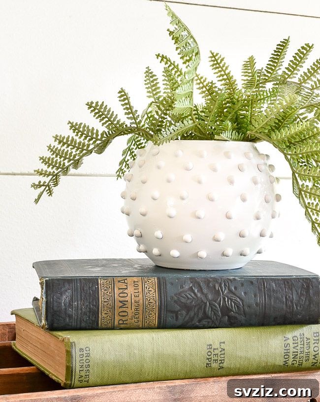 DIY Hobnail Milk Glass replica from Dollar Tree vase, pearl stickers, and spray paint