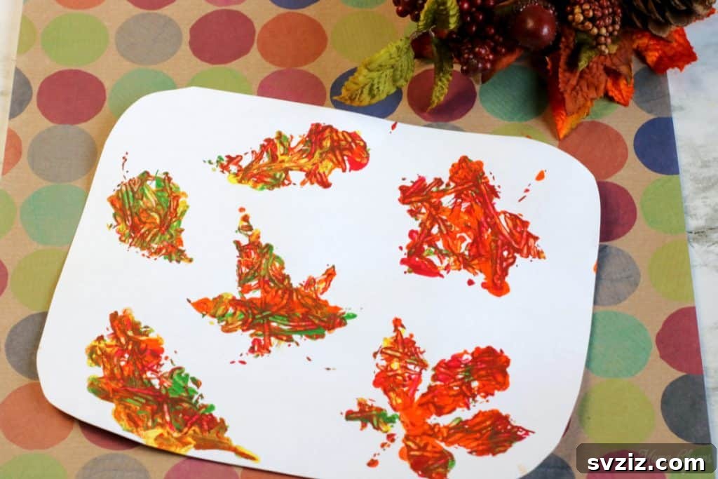 61 Charming & Simple Paintings for Aspiring Artists 55 Fall Leaves Marble Painting, a vibrant art activity for children