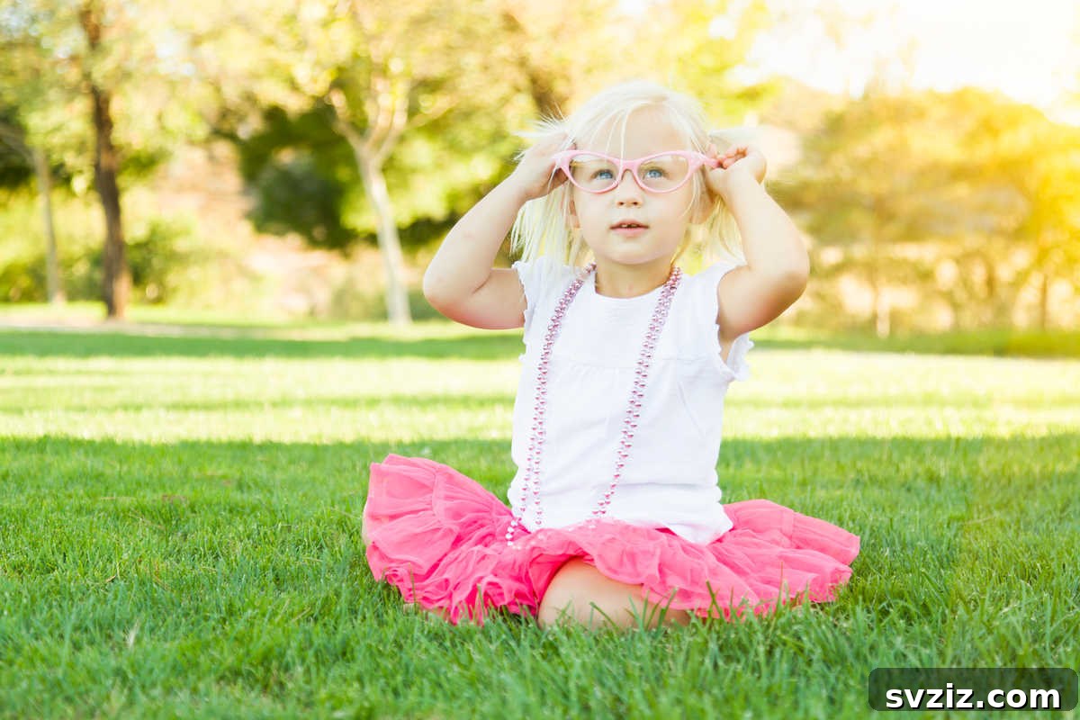 41 Creative Play Ideas for Two-Year-Olds 24 A child dressed in a superhero costume, engaging in imaginative play.