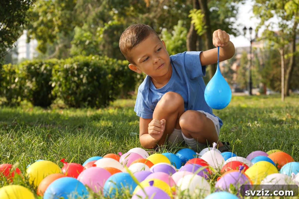 Colorful sponge water bombs ready for a fun and splashy outdoor water fight on a sunny day.