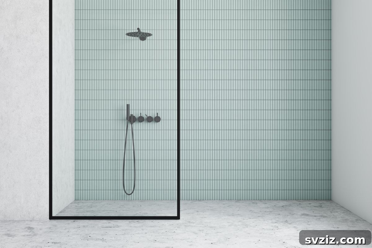 Blue and white tiled walk-in shower