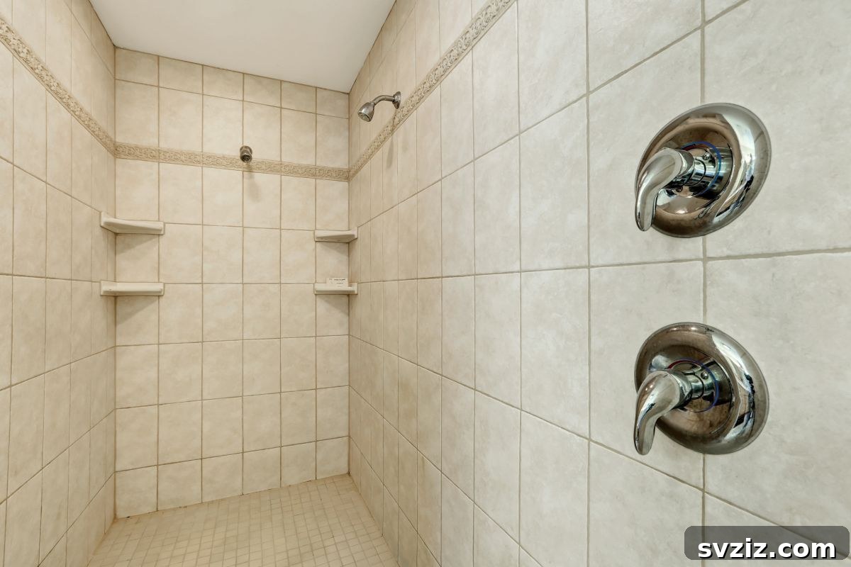 Long walk-in shower with accessibility features