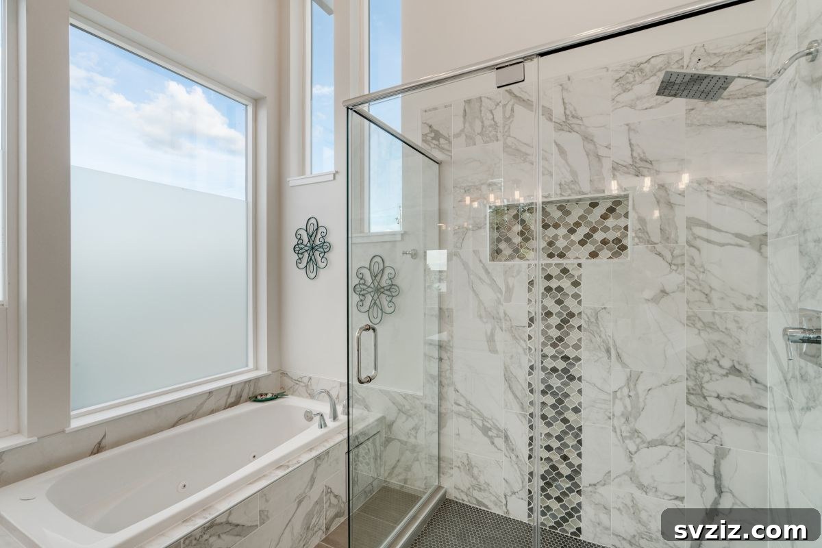 Luxury walk-in shower with marble tiles