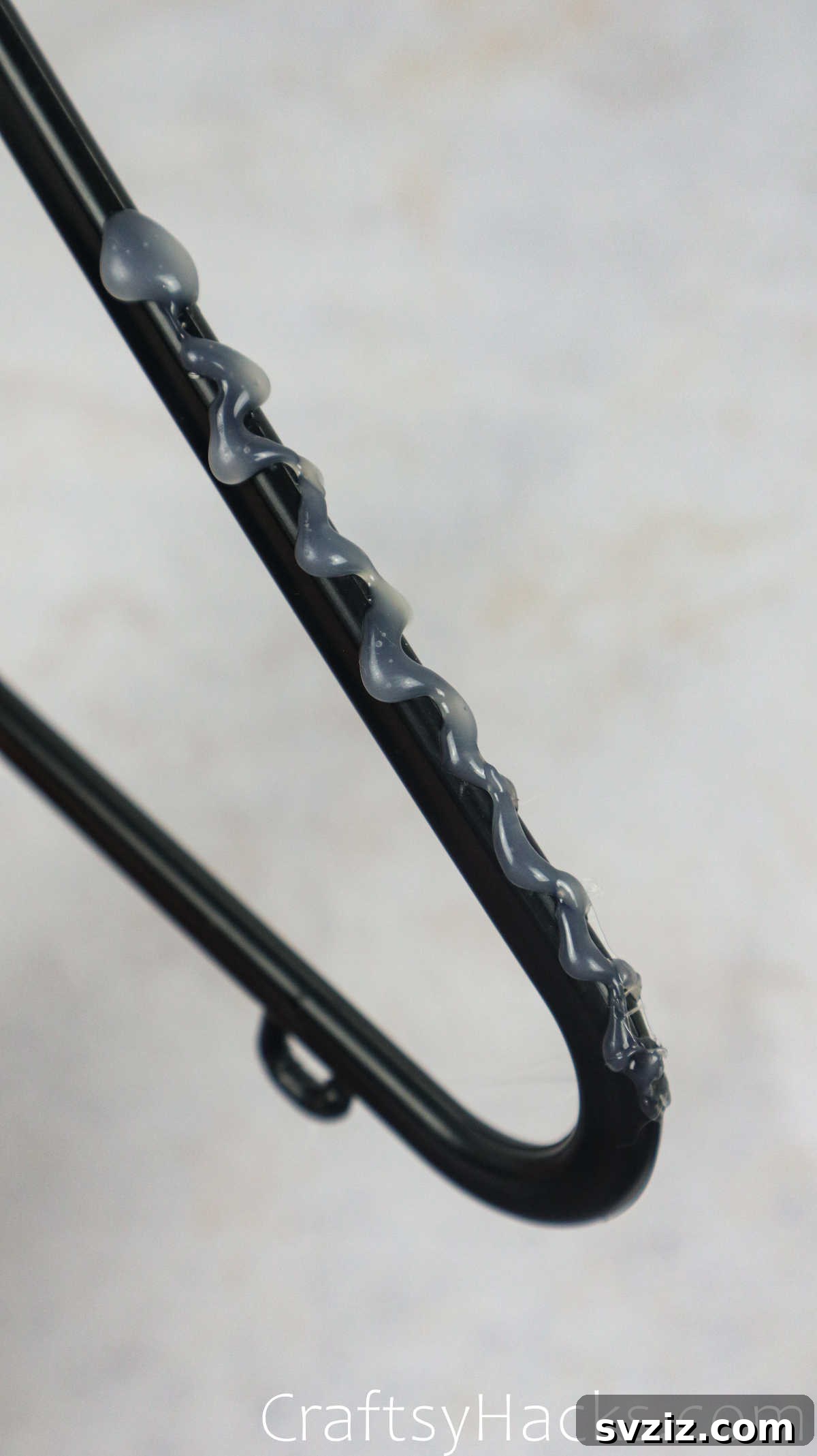 Applying Hot Glue Grooves to Hangers for Improved Grip