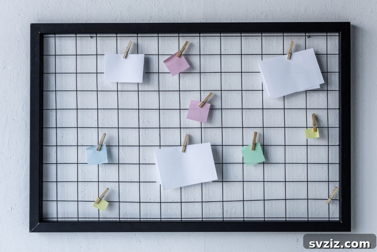 A creative bulletin board in a dorm room, displaying colorful hanging notes, photos, and pegs for organization and personalization.