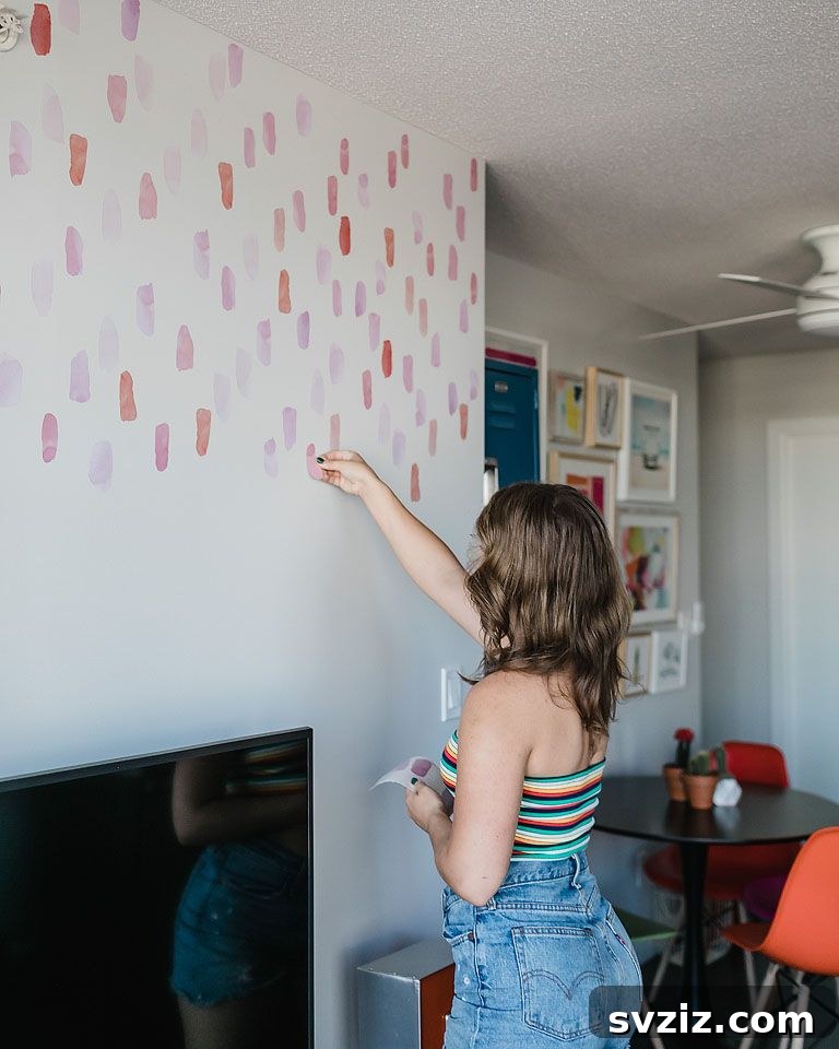 A stylish dorm wall adorned with easy-to-apply and removable wall decals featuring a motivational quote.