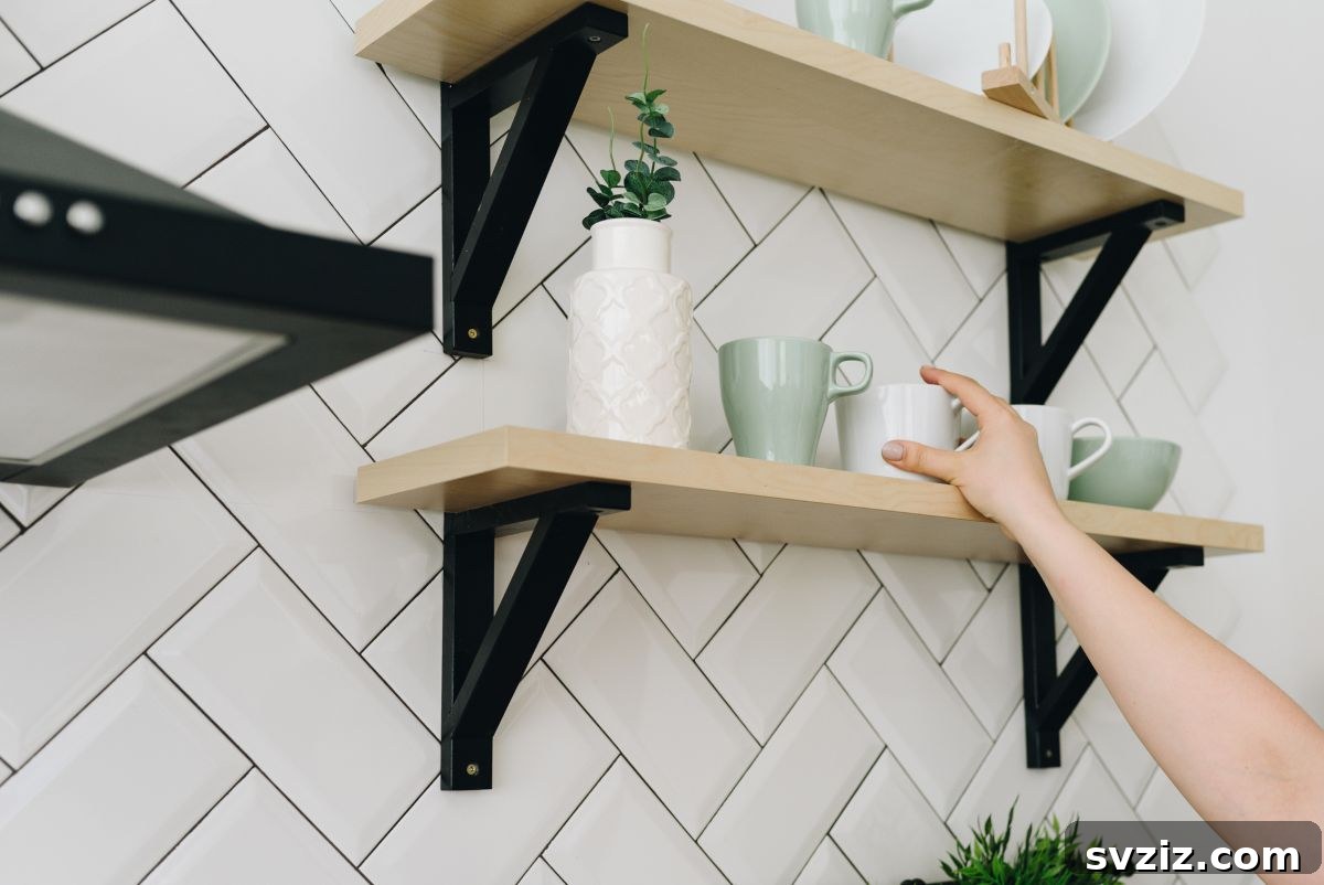 Elevate Your Kitchen: 41 Chic Wall Decor Ideas 20 Modern kitchen with a tiled accent wall