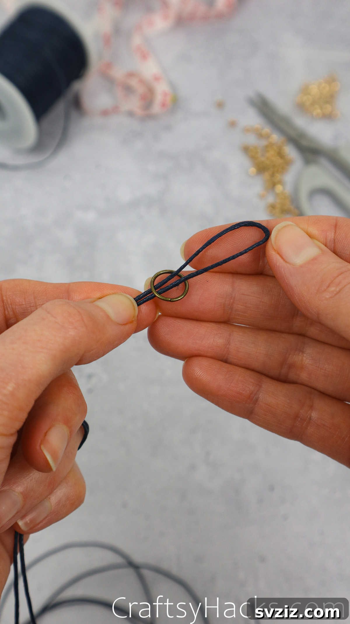 looped cord in ring