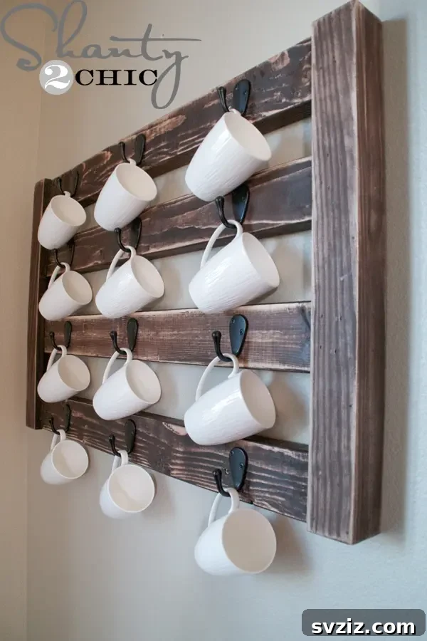 Decorative wall display of coffee mugs using repurposed Dollar Tree coat racks